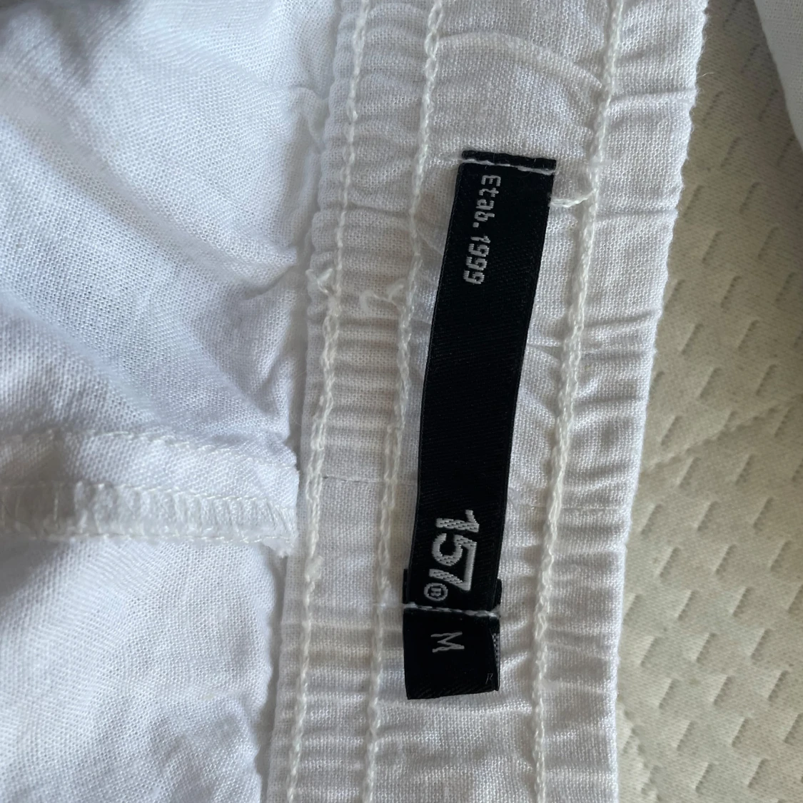 Vita linnebyxor från 157