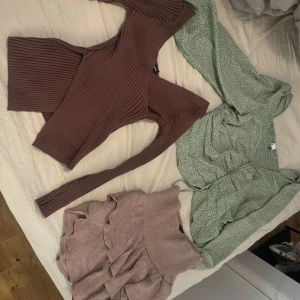 Olika kläder - Säljer lite kläder som ett paket från lite olika ställen och lite olika storlekar.  En grön blommig blus från hm i storlek 38/M men sitter som en S.  En brun tröja från shein i storlek S  En beige kjol från shein i storlek S  Vita linne byxor från lager 157 helt oanvända i storlek xs, upptäckte att dom var för små lite för sent.  En orange klänning från hm i storlek S  Blått Linne från shein i storlek L men passar mig som vanligtvis har S Ett brunt linne från bikbok i storlek S Går o köpa separa