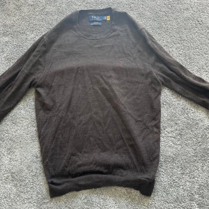 Brun merino sweater från Polo Ralph Lauren - Merino sweater från Ralph Lauren. Mycket bra skick