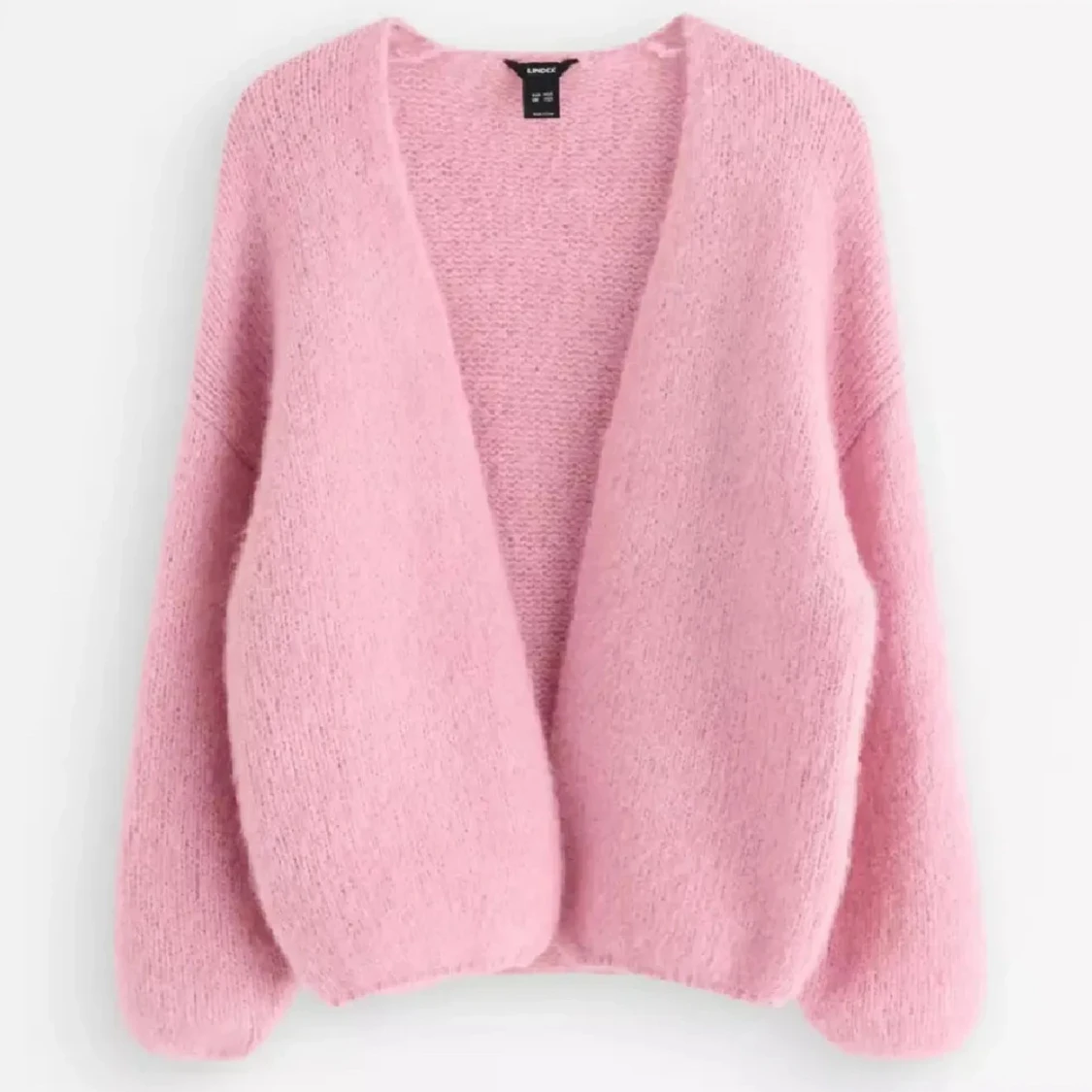 Rosa stickad kofta från Lindex