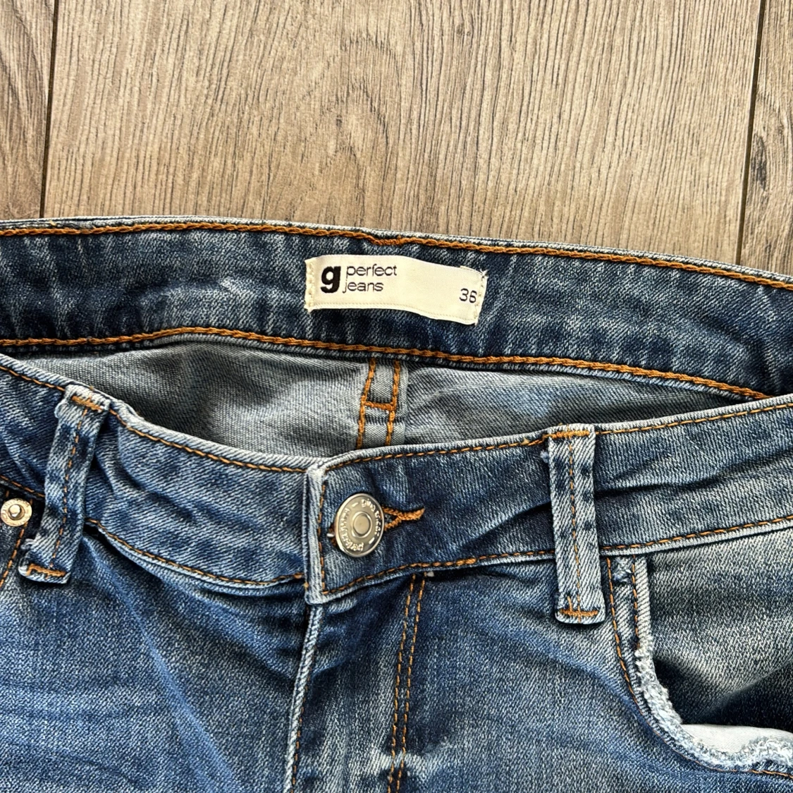 Blå bootcut lågmidjade jeans - 4