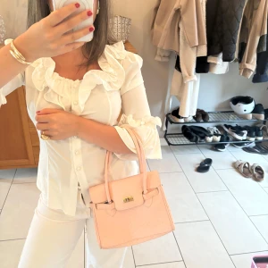 Rosa handväska  - Skitgullig handväska