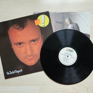 Phil Collins - "No Jacket Required" LP - Phil Collins - "No Jacket Required" Vinyl  1985 Europe Press  Konvolut: VG+ Vinyl: VG+