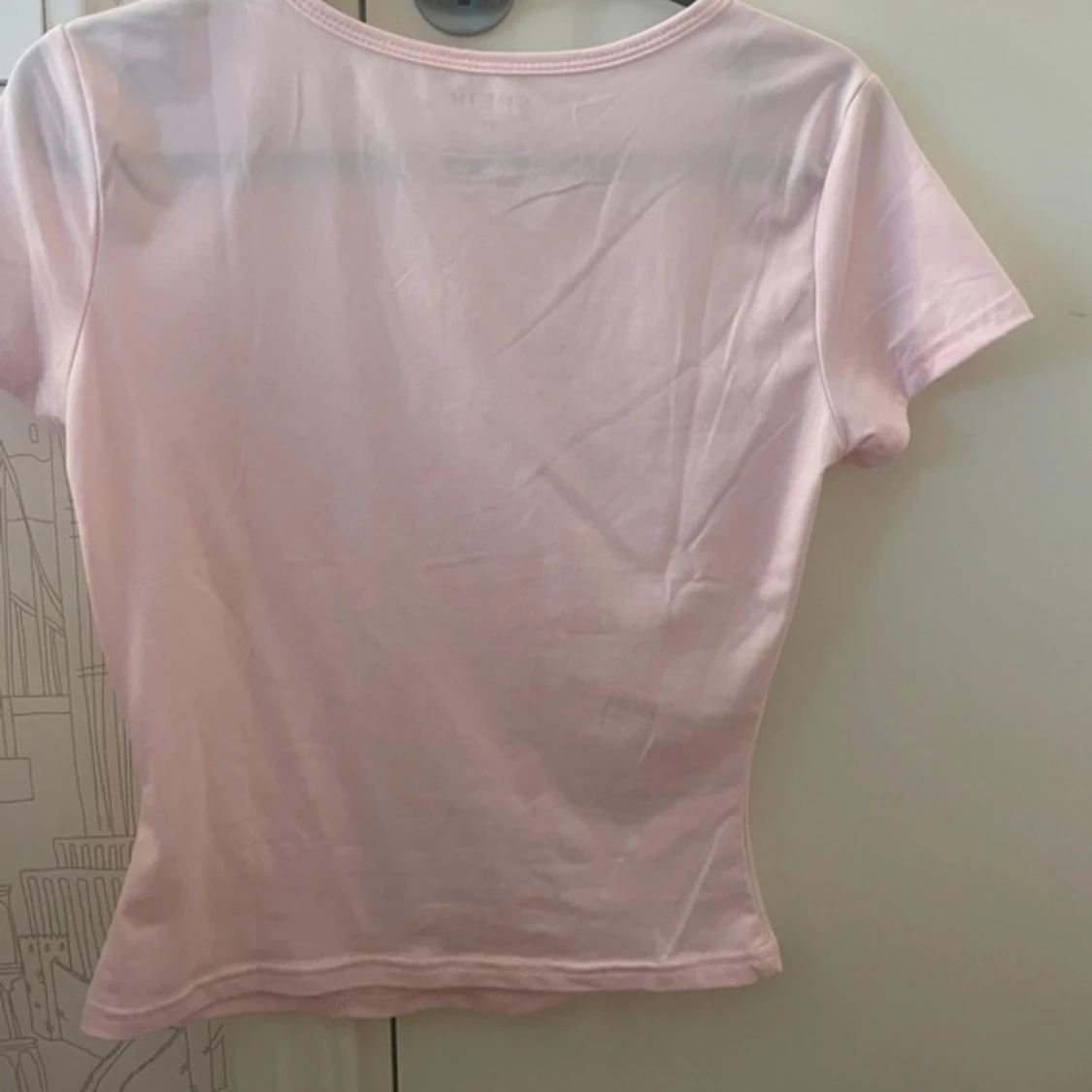 Ljusrosa t-shirt från SHEIN - 1