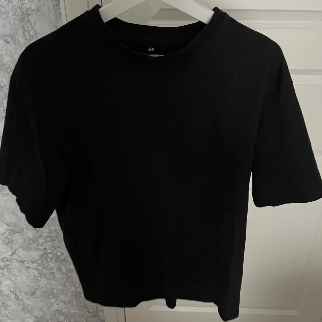 Svart relaxed fit t-shirt från H&M - 1