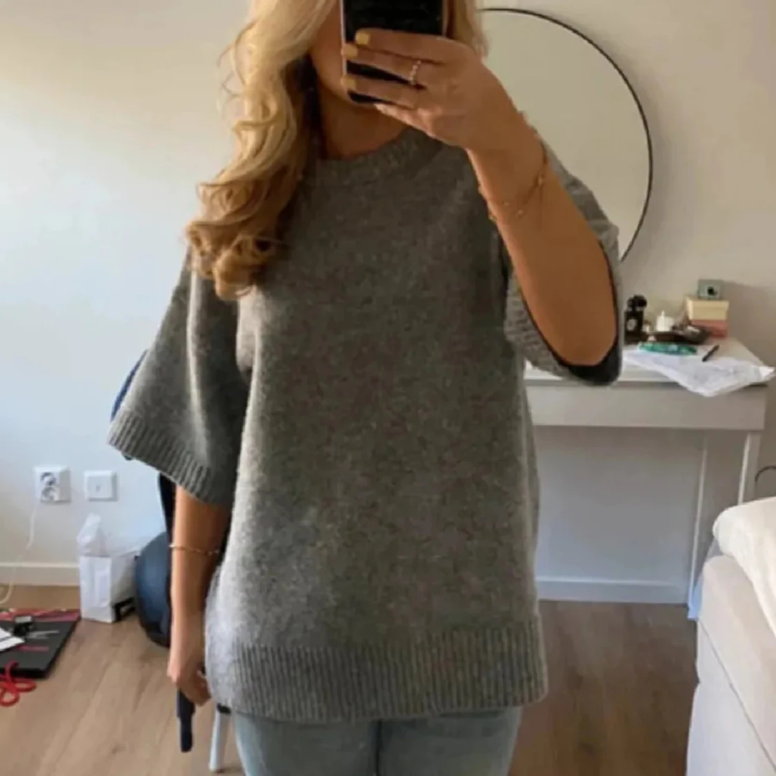 Trekvartsärmad stickad tröja 