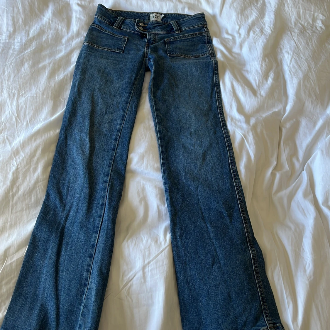 Blå bootcut jeans från 157