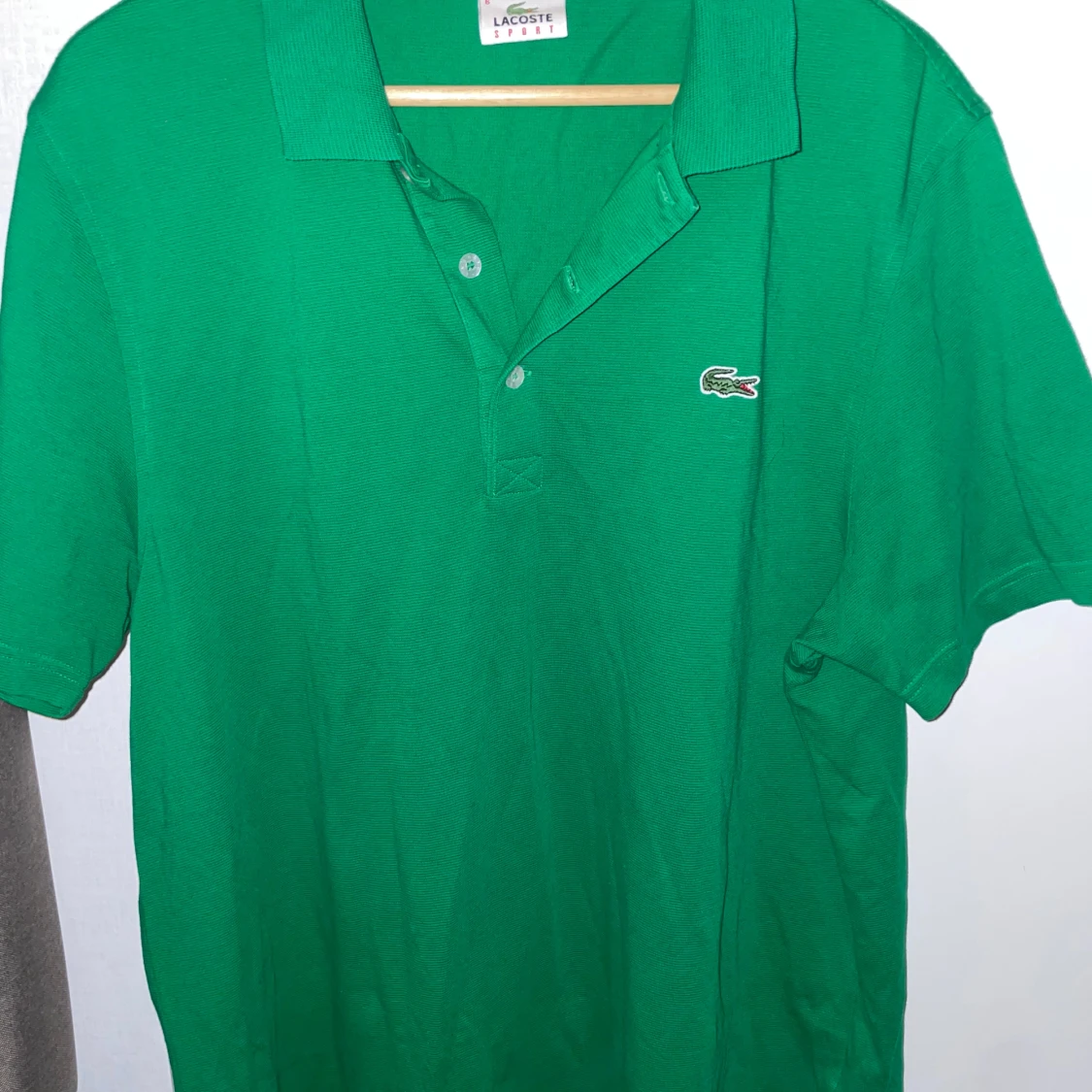 Grön Lacoste Sport pikétröja