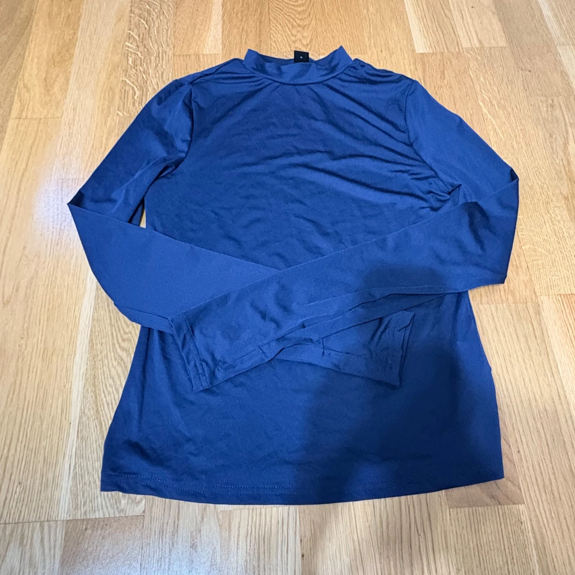 Mörkblå långärmad polotröja