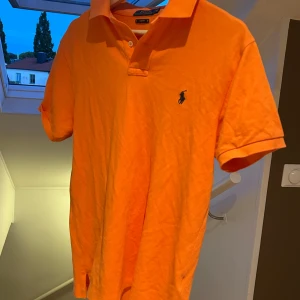 Orange pikétröja från Ralph Lauren - Orange Ralph Louhren pike 