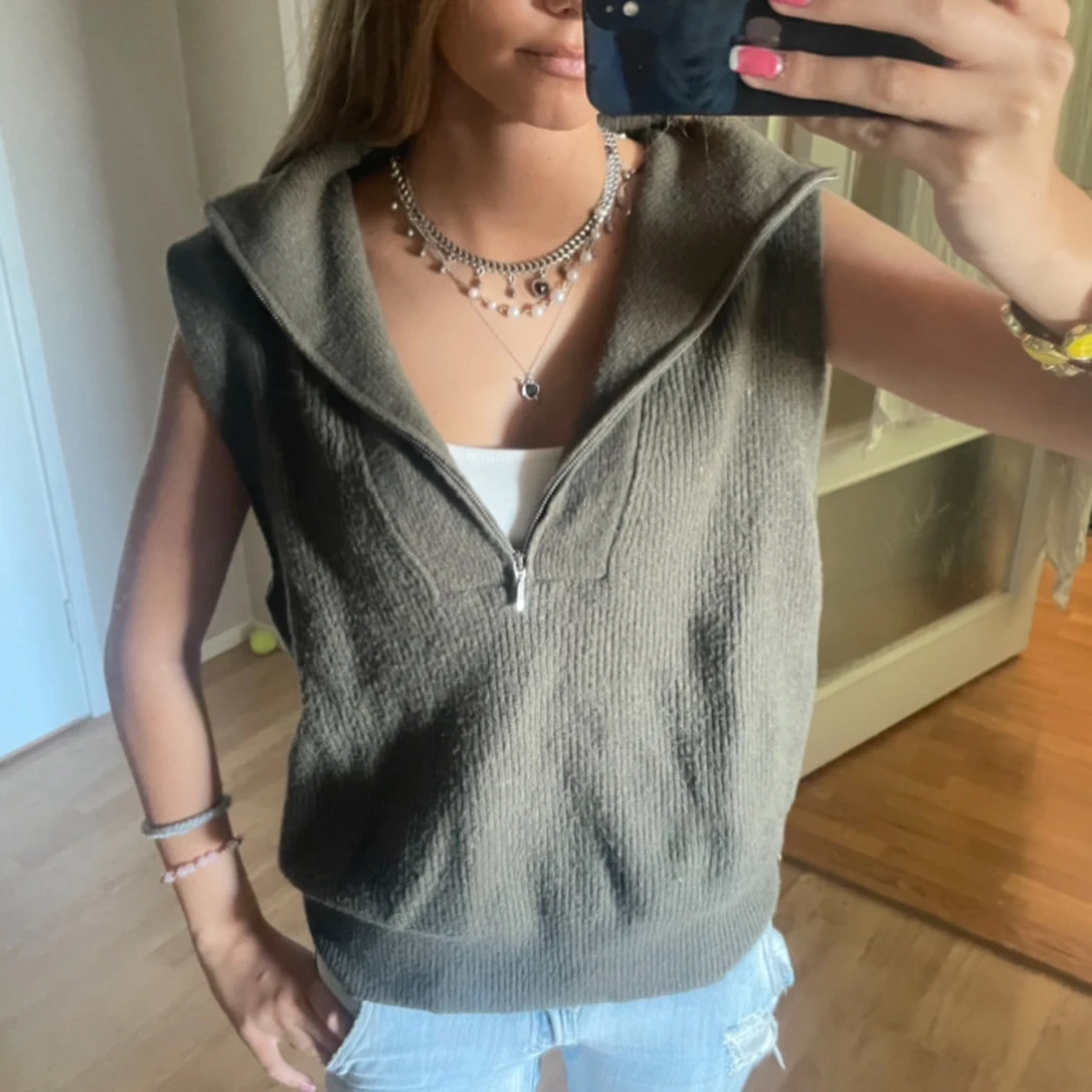 Olivgrön stickad väst med half zip - 1