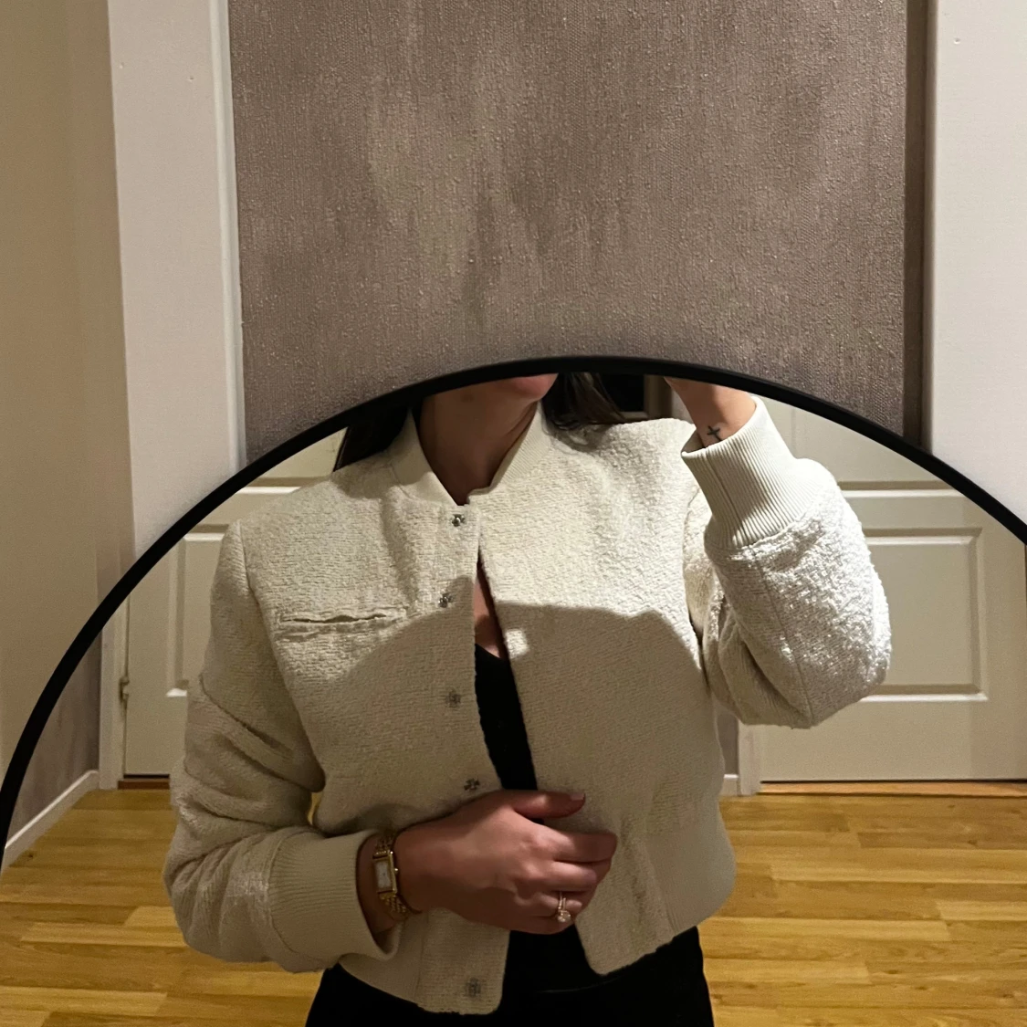 Cremefärgad bomberjacka