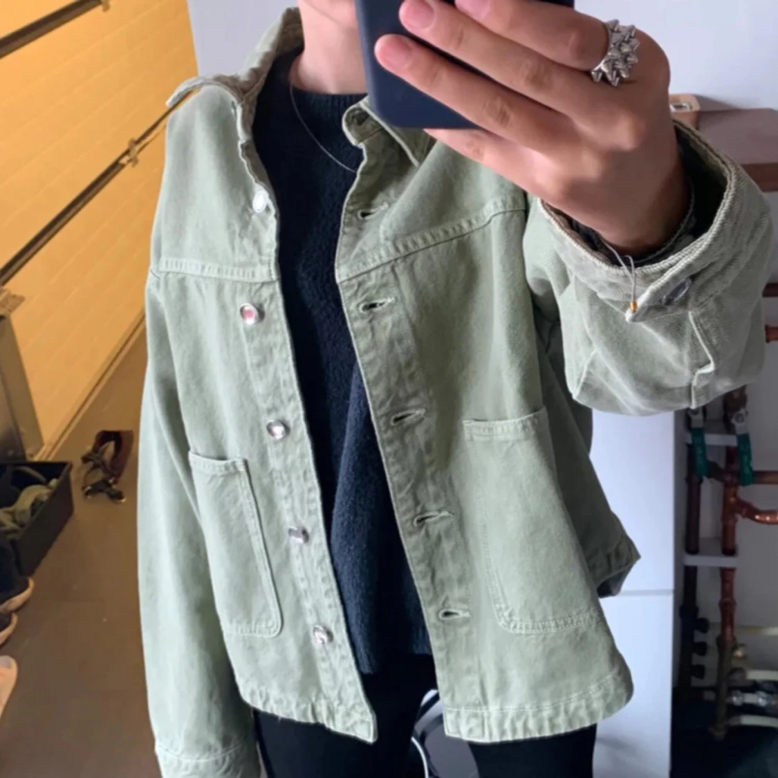 Grön jacka med knappar