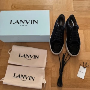 Svarta sneakers från Lanvin - Vill gärna byta skor, men det ska vara mot ett par andra skor i storlek 45-46