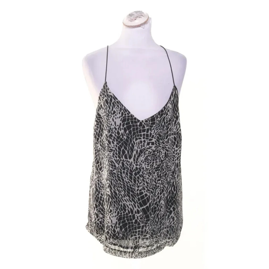 Svartvit mönstrad topp med tunna band