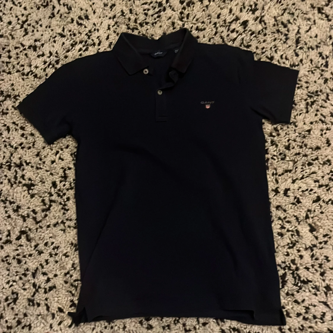 Svart pikétröja från GANT