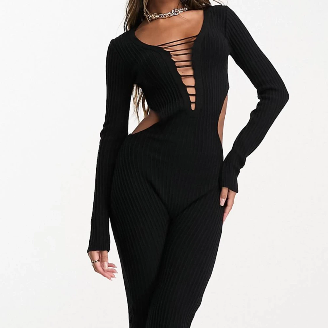 Svart ribbad jumpsuit med snörning