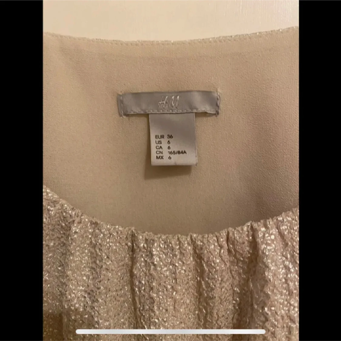 Glittrig linnetopp  - 1