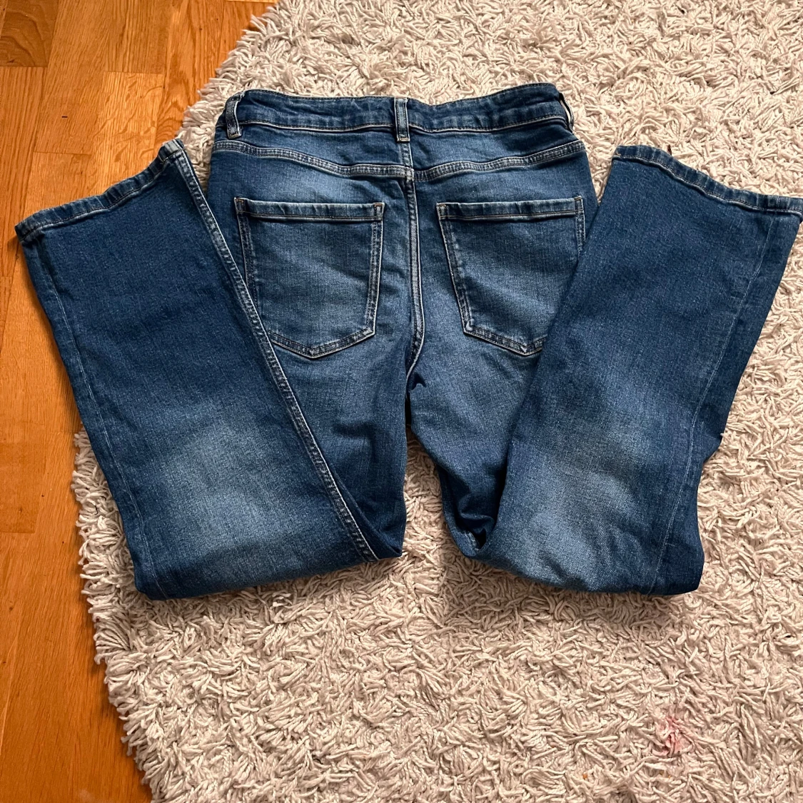Högmidjade blå jeans storlek 40 - 2