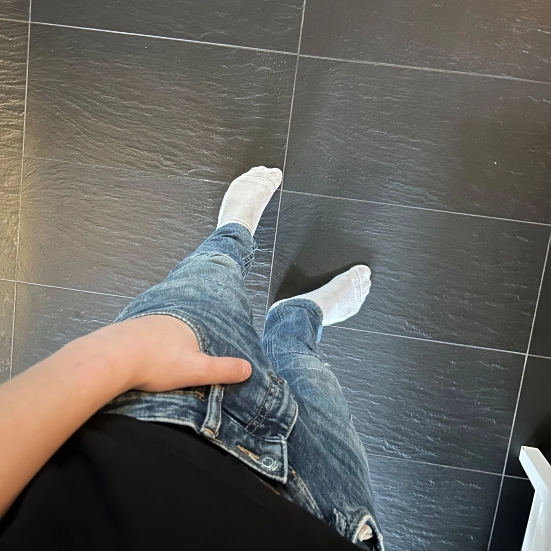 Jeans med slitningar