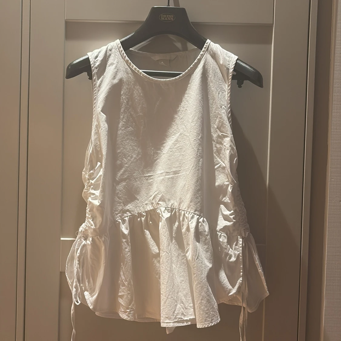 Vit ärmlös topp från H&M