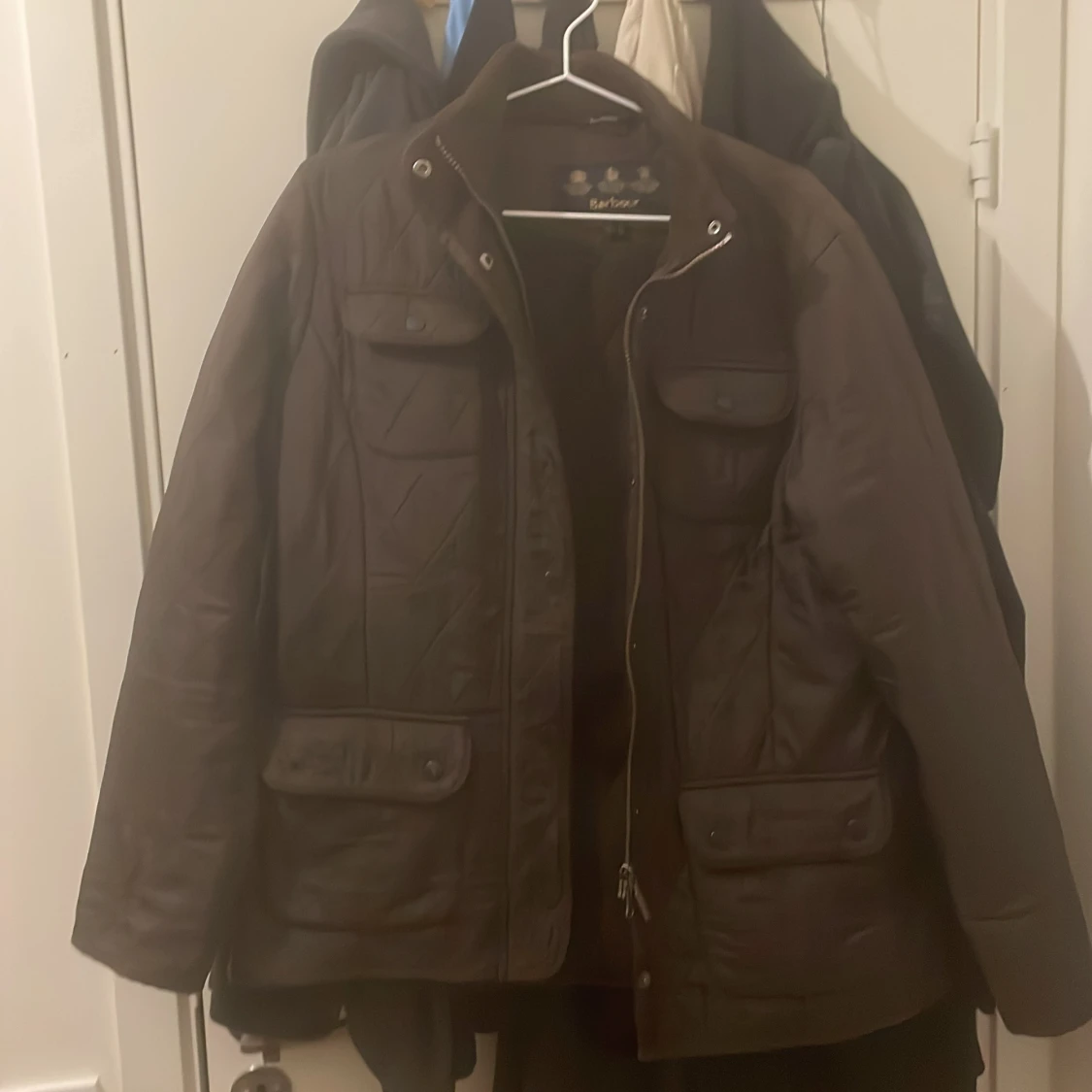 Brun quiltad jacka från Barbour