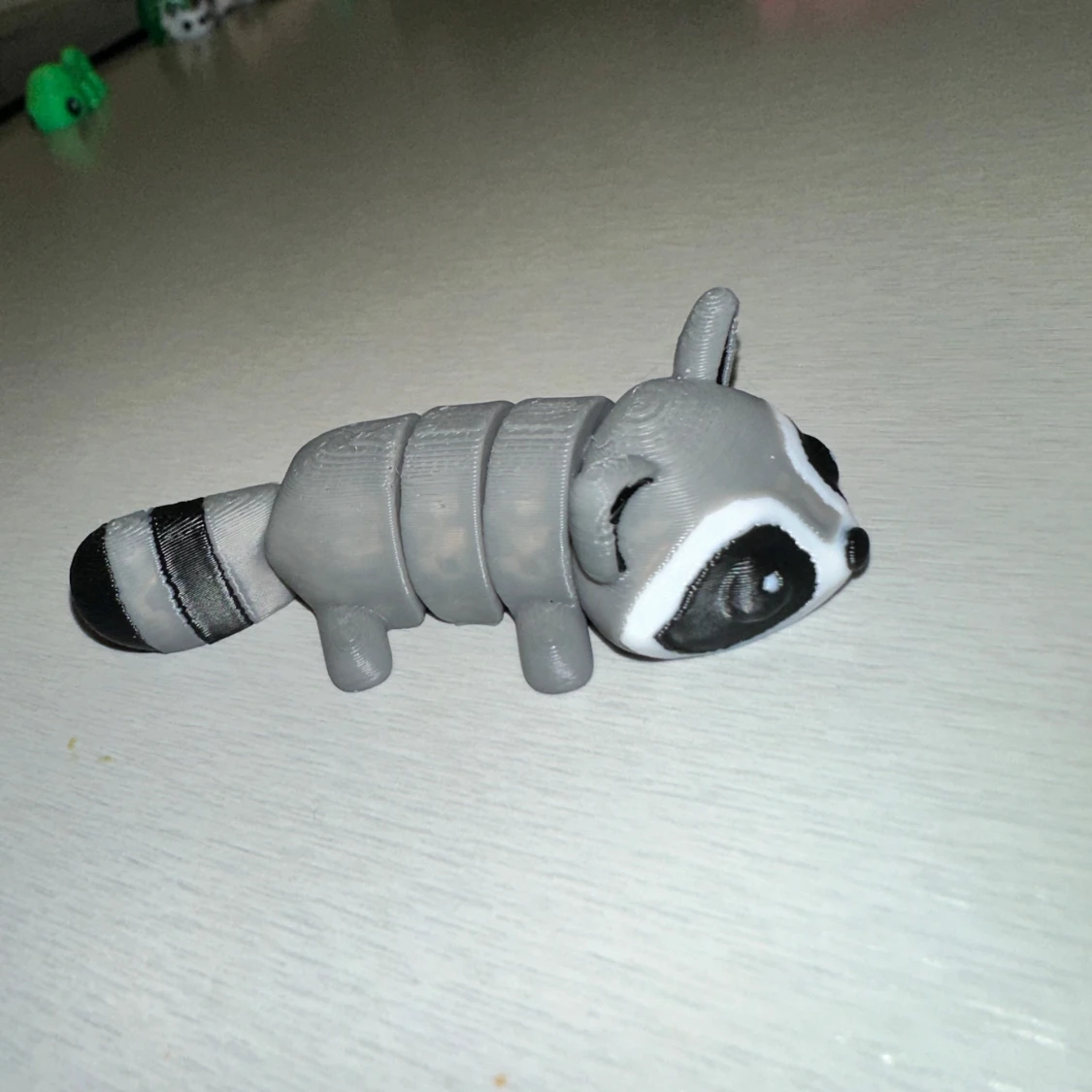 Grå tvättbjörn figur