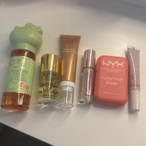 Sminkprodukter från olika märken - Detta är ett set med smink och hudvårdsprodukter som inkluderar: Pixi Hello Kitty Glow Tonic, NYX Honeydew Me Up Primer, Hicaap Bronze Glow Self Tanning Drops, Makeup revolution Conceal & Define i färg C2, NYX Professional Makeup Buttermelt Blush i färg u know butta och Anastasia Beverly Hills Blush i Baby Pink. Pixi glow tonic är o öppnad och revolution concealer är oxå oöppnad . Resten testade nån enstaka gång.