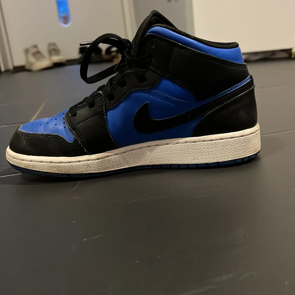 Nike Air Jordan 1 Mid Svart/Blå