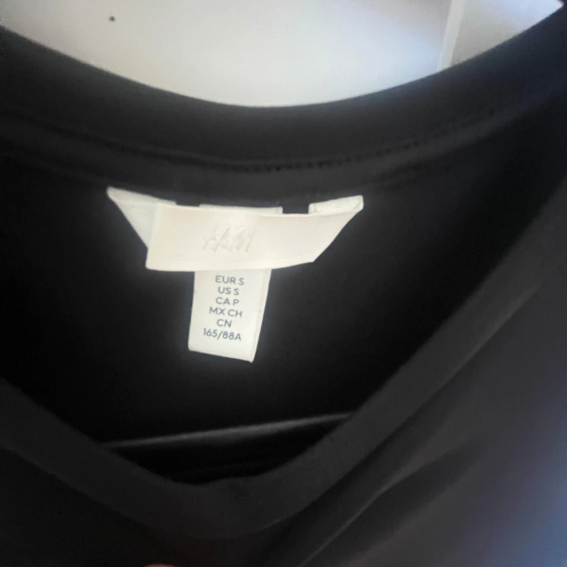 Svart kortärmad topp från H&M - 2