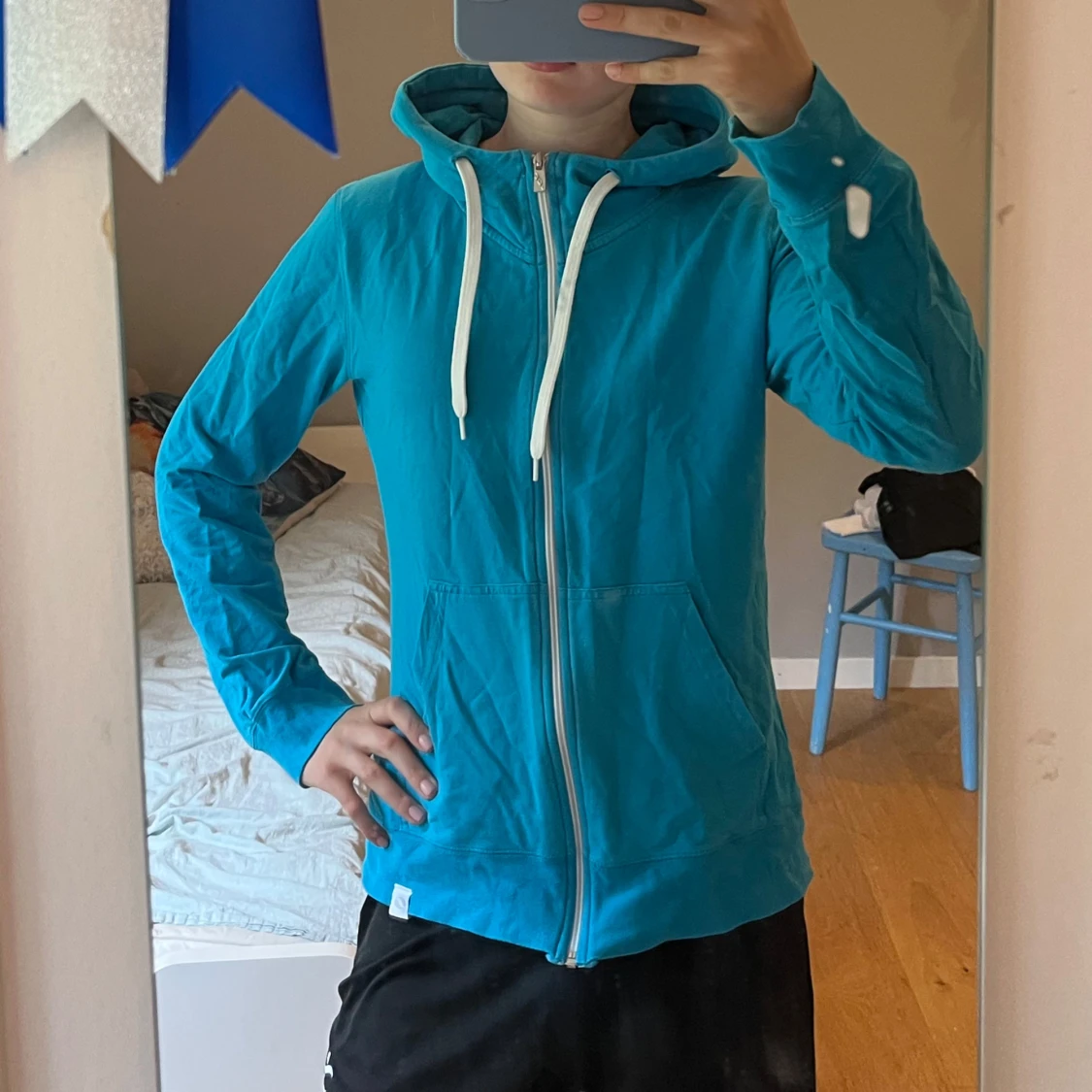 Turkos hoodiejacka från SOC