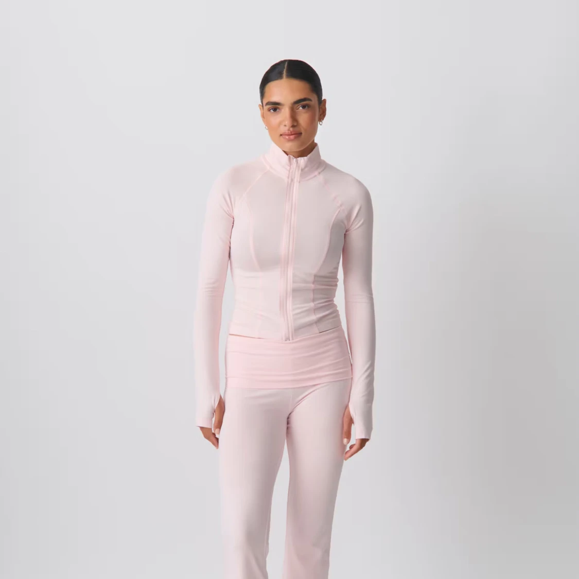 Ljusrosa gina zip tröja