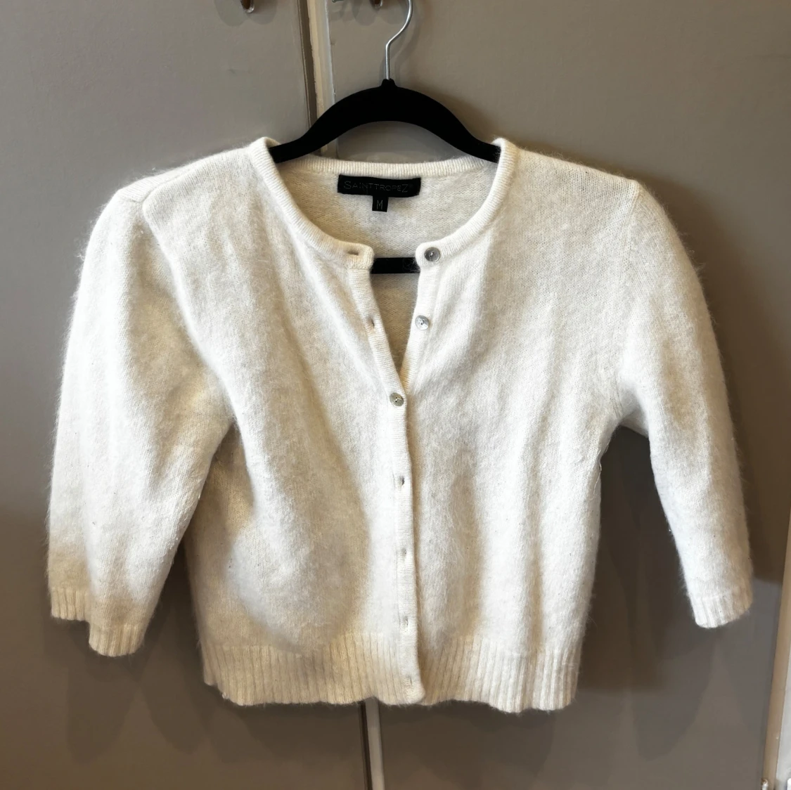 Tre kvarts stickad kofta