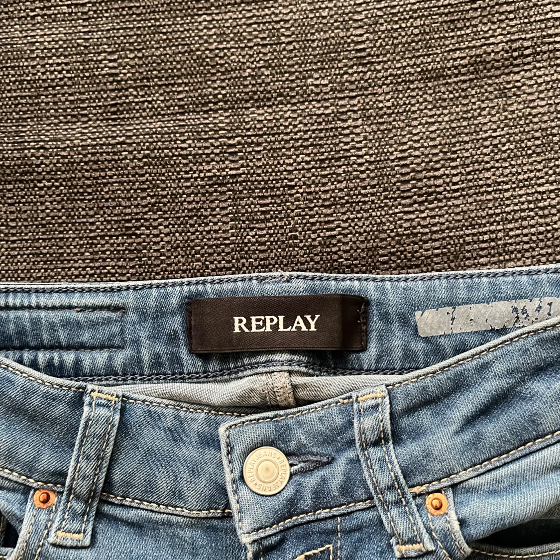 Blå lågmidgade bootcut jeans från Replay - 2