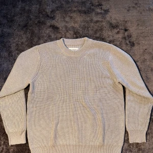 👕Maison Margiela Sweater 👕 - Color: 🌫️ Gray Size: M  Condition: 🆕 Brand New 🆕   A rare piece from Maison Margiela — minimalistic gray sweater with subtle details and premium fabric. Fits true to size (M), slightly oversized look for that signature Margiela silhouette. Soft, warm, and stylish. 🔍 A must-have for anyone into clean, designer style.