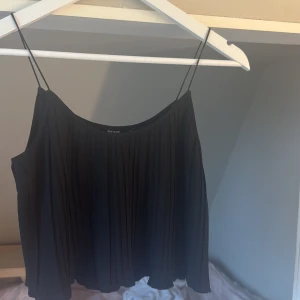 Svart  linne Bik Bok - En svart ribbad topp från vinbok aldrig använd 