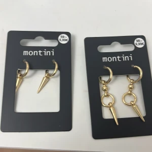 Guldiga örhängen med spetsdetalj Montini - Två par guldiga örhängen från Montini. HELT NYA!!!! Båda för 80kr. Separat - Små : 35 kr Stora : 55 kr
