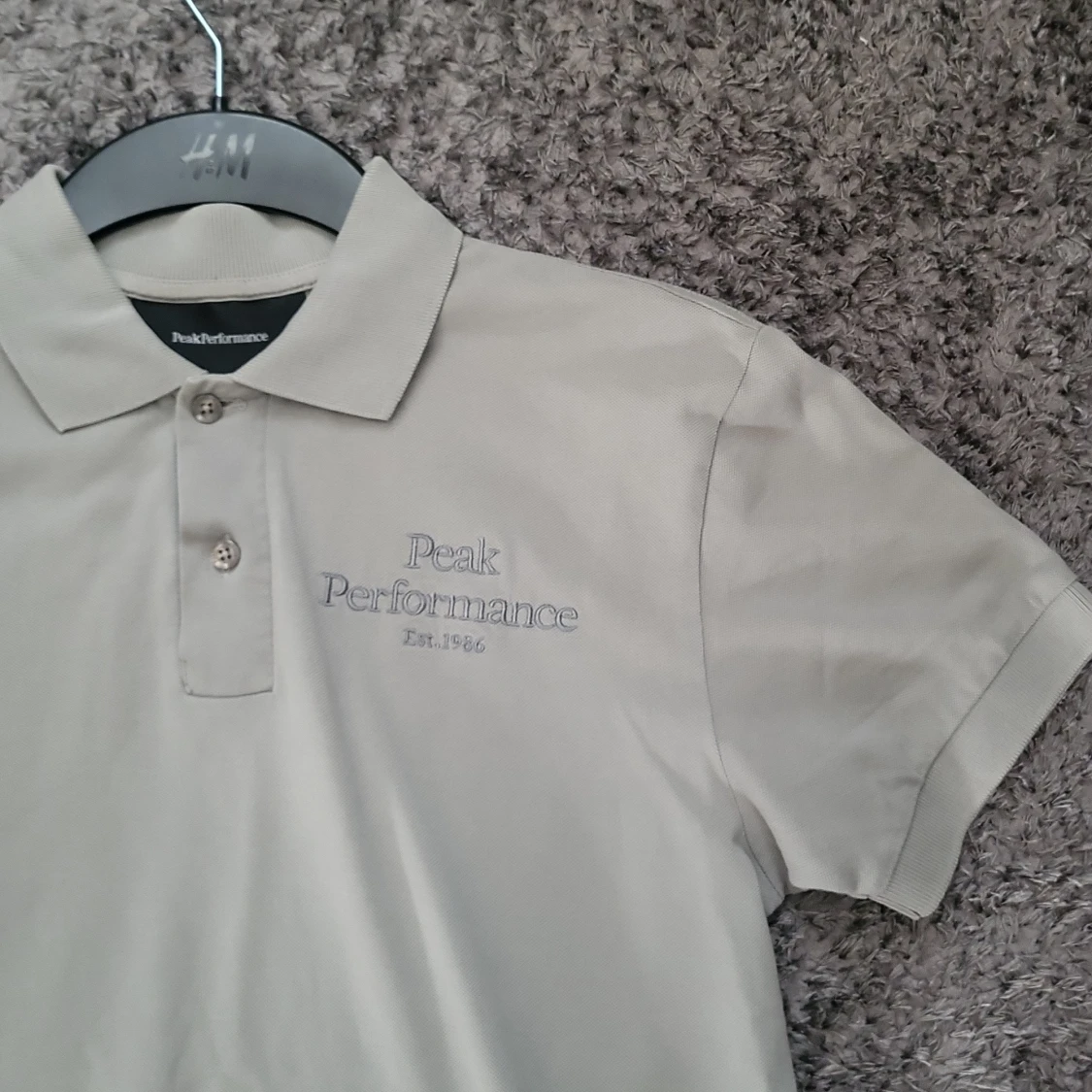 Ljusgrå pikétröja Peak Performance - 1