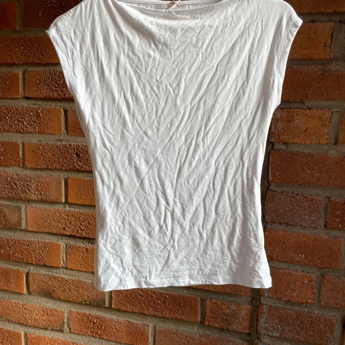 Vit ärmlös topp från Nelly