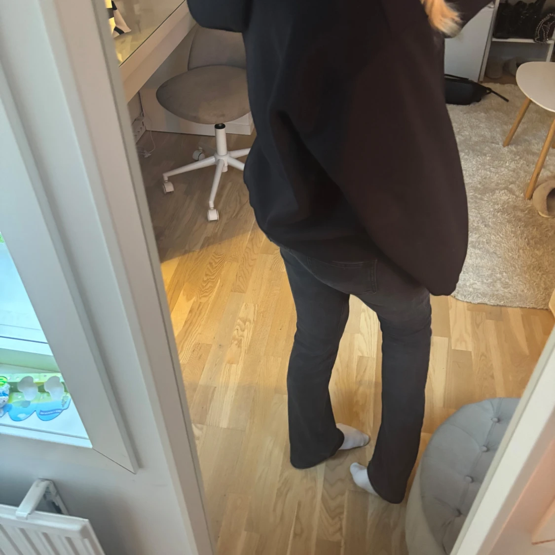 Svarta lågmidjade bootcut jeans med slitning - 1