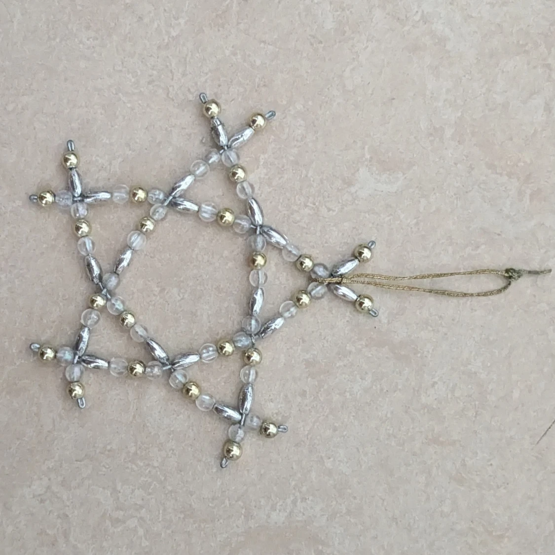 Pärlad stjärna i silver och guld - 4