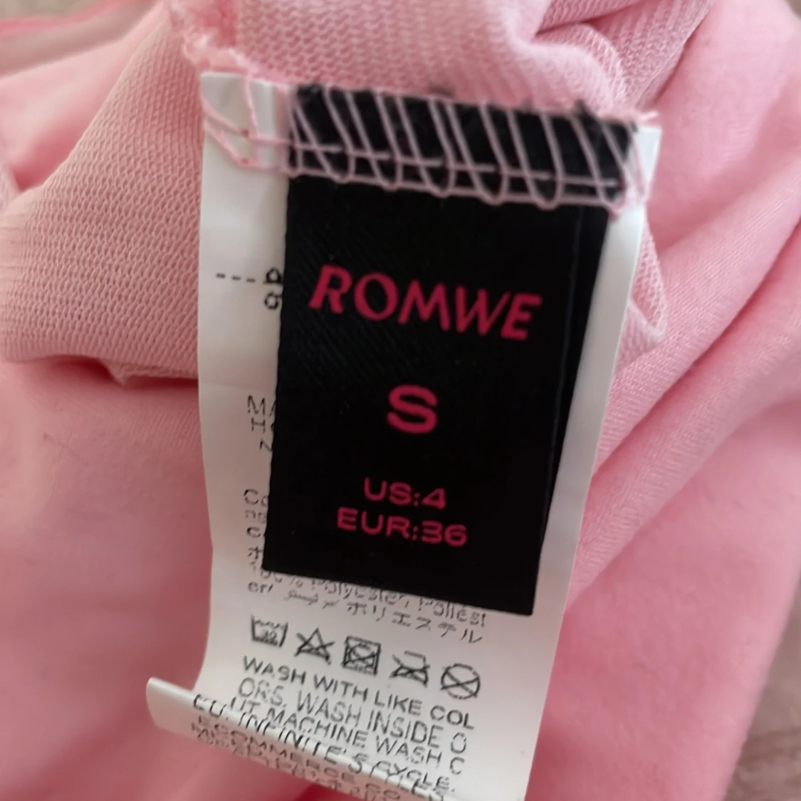 Rosa linnetopp med rosett från Romwe - 2