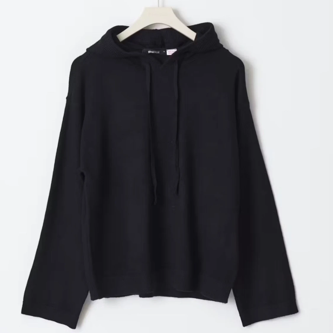 Svart stickad  hoodie 