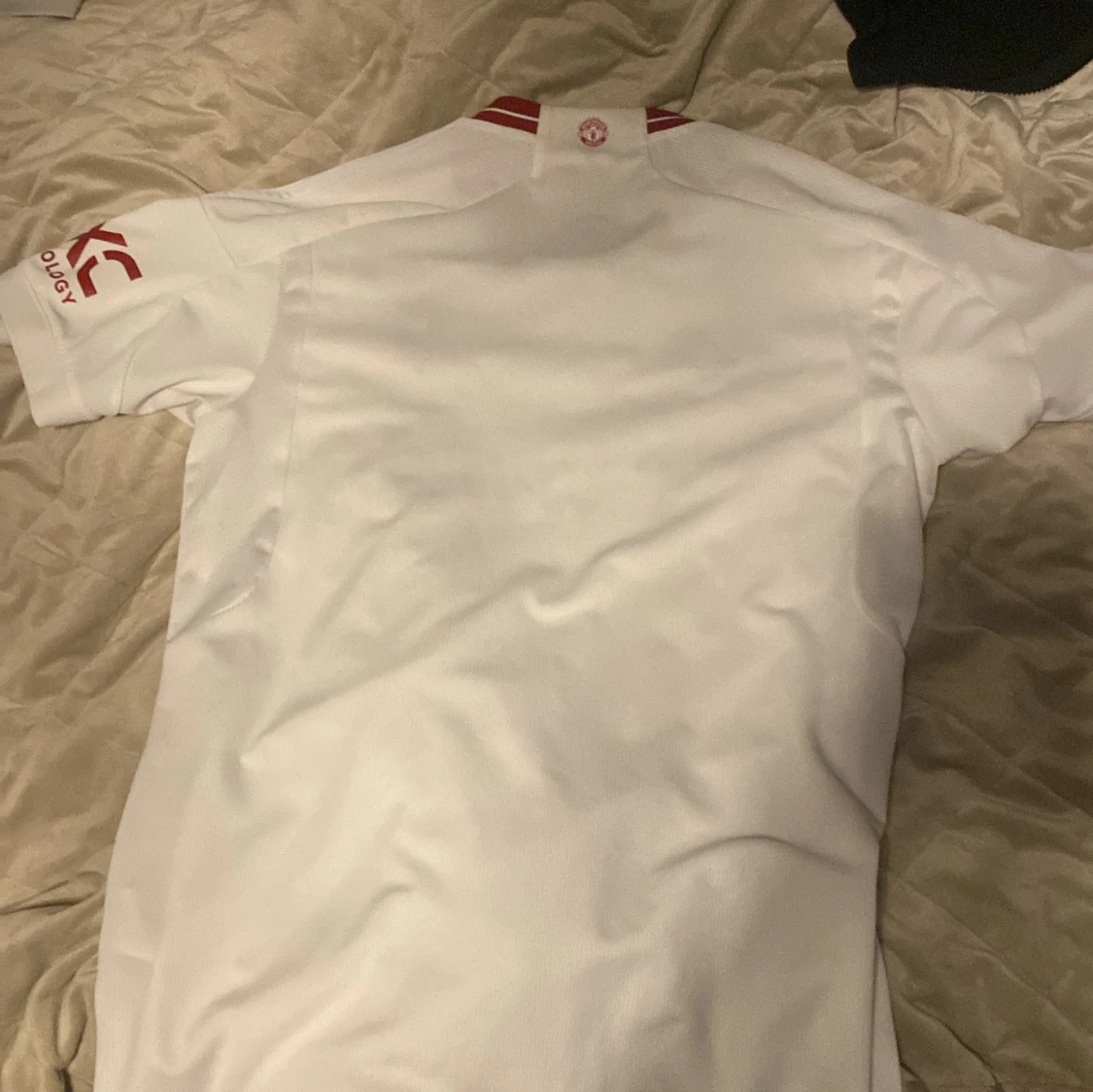 Vit fotbollströja med röda detaljer Manchester United - 1