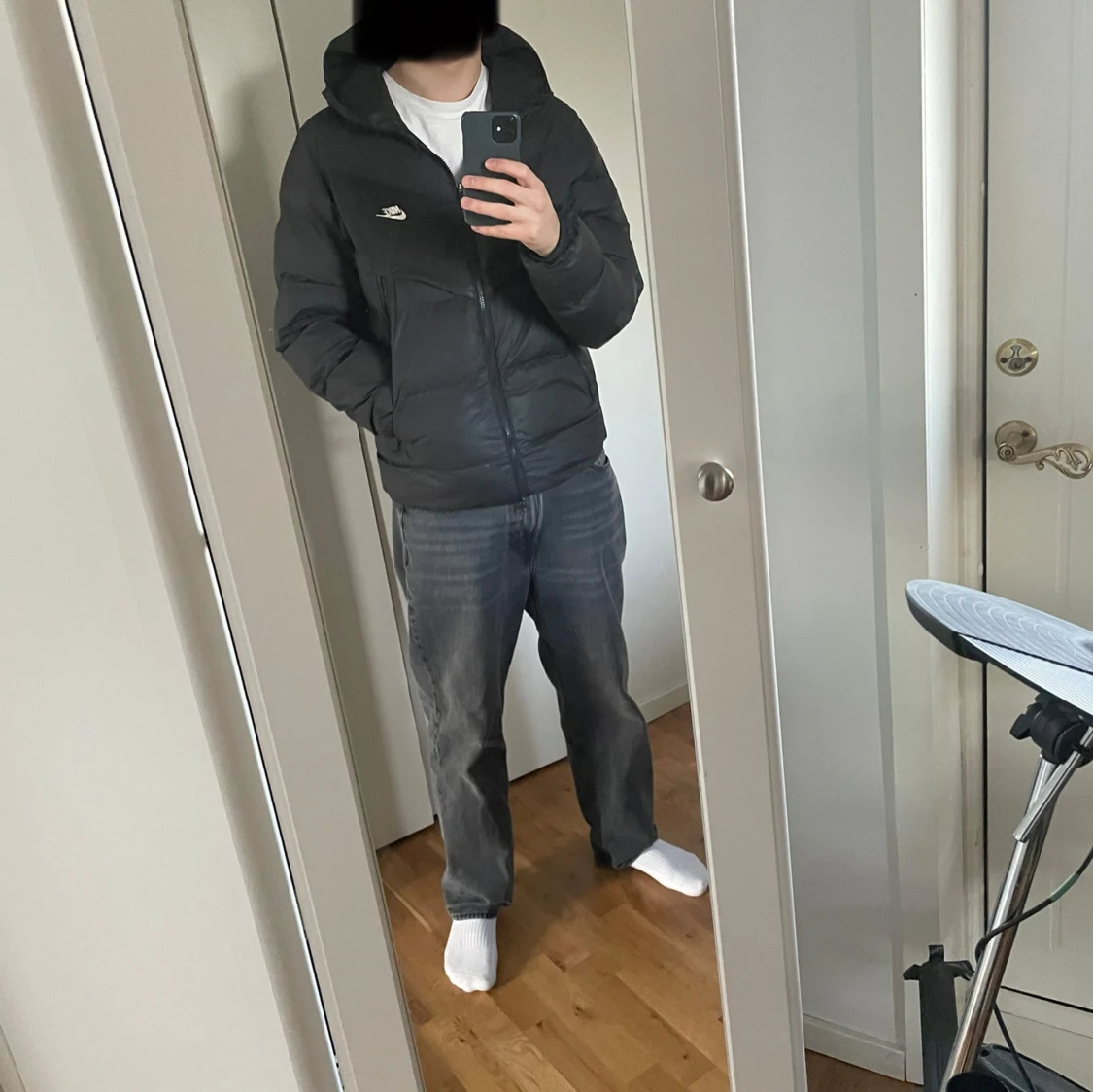 Svart pufferjacka från Nike