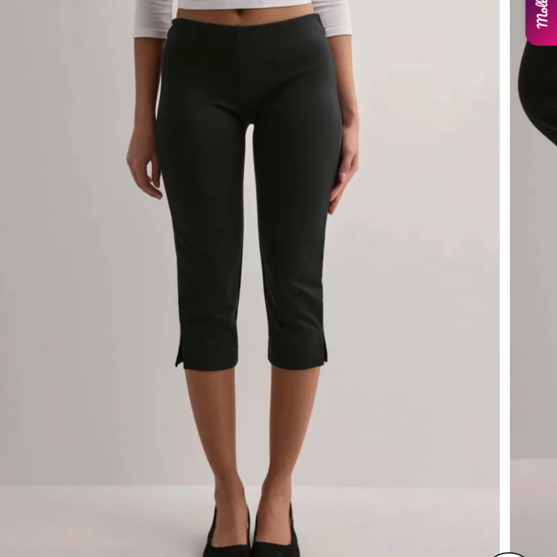 Svarta croppade byxor med slits - 1