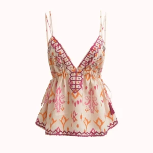 Broderad linnetopp med snörning - Superfin linnetopp med broderade detaljer i rosa och orange på beige botten. Djup v-ringning med snörning framtill och tunna axelband. Toppen har en luftig passform och dekorativa kanter, perfekt för varma dagar.