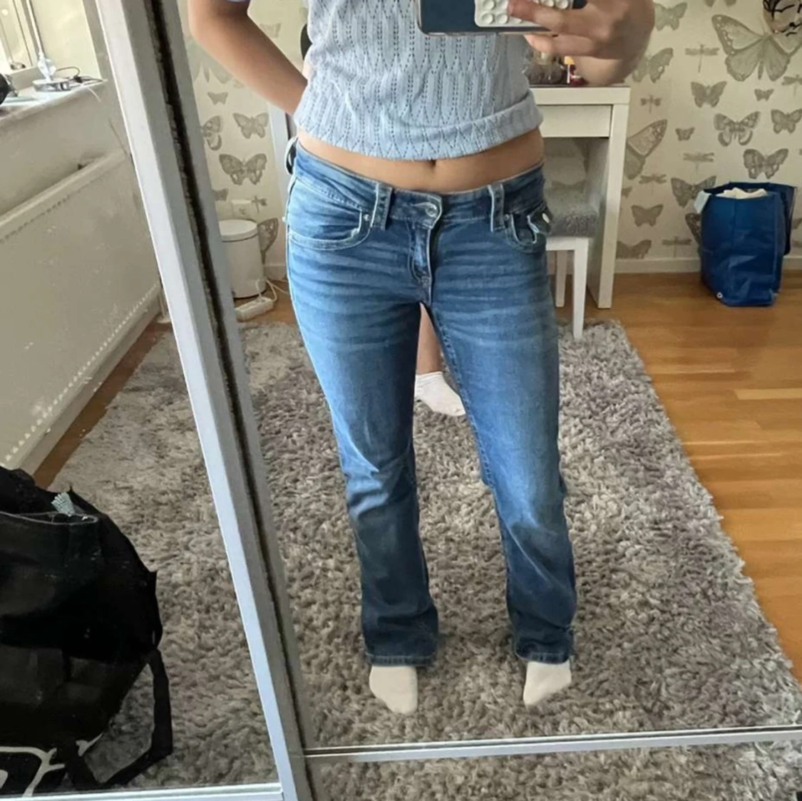 Blå bootcut jeans med låg midja