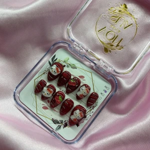 CherryKitty (S);Short Almond - Snygga gelé press-on naglar i mandelform med glittrig röd bas, dekorerade med 3D Hello Kitty-motiv och körsbärsdetaljer. Perfekt för dig som vill ha en söt och unik look. Kommer i storlek  S: 15 mm, 11,5 mm, 12 mm, 11 mm, 9 mm 