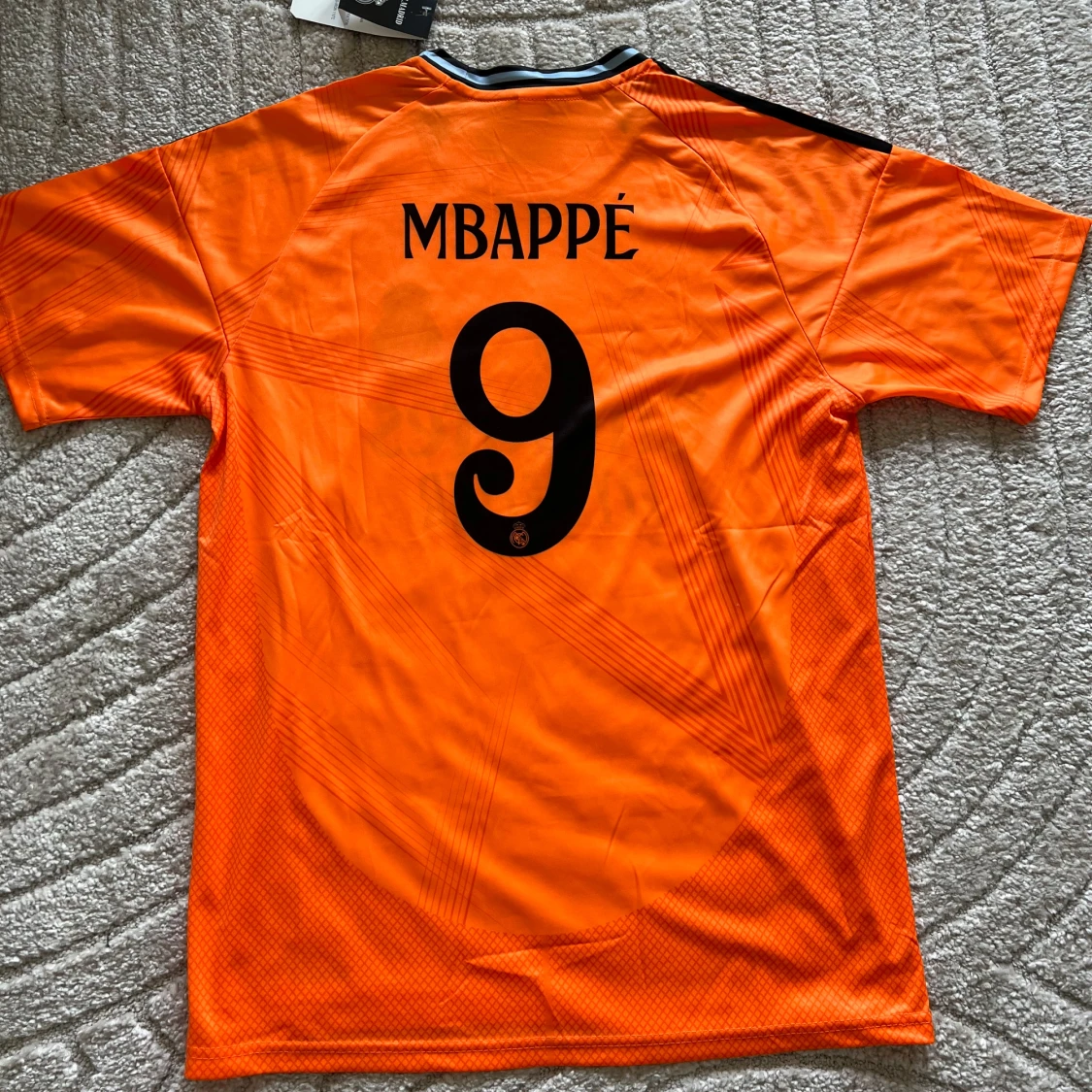 Real Madrid Mbappé orange match kit - 1